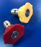 Pressure washer spray nozzles with red and yellow caps on blue surface, designed for different spray patterns.